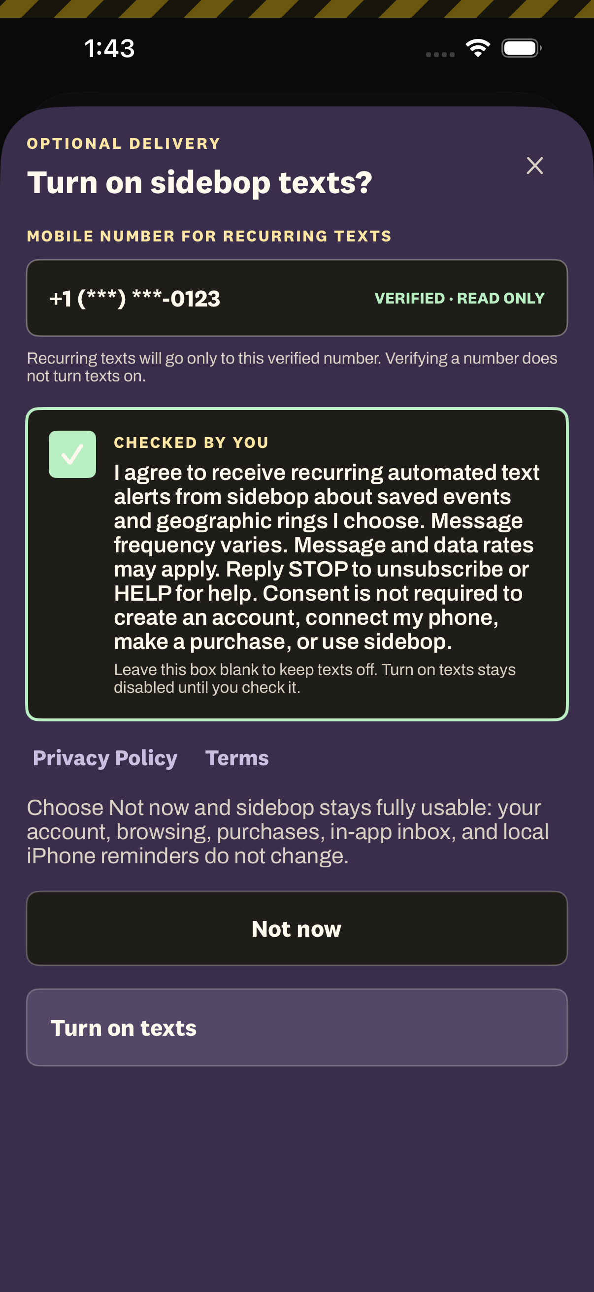 Native sidebop iOS consent form after the user deliberately checks the SMS box, showing the same masked verified mobile-number field and enabled Turn on texts button together.